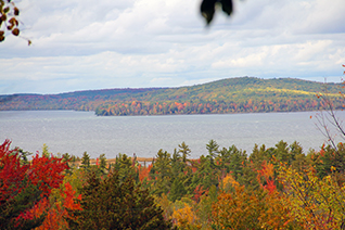 Beautiful fall foliage surrounds Grand Traverse Bay.